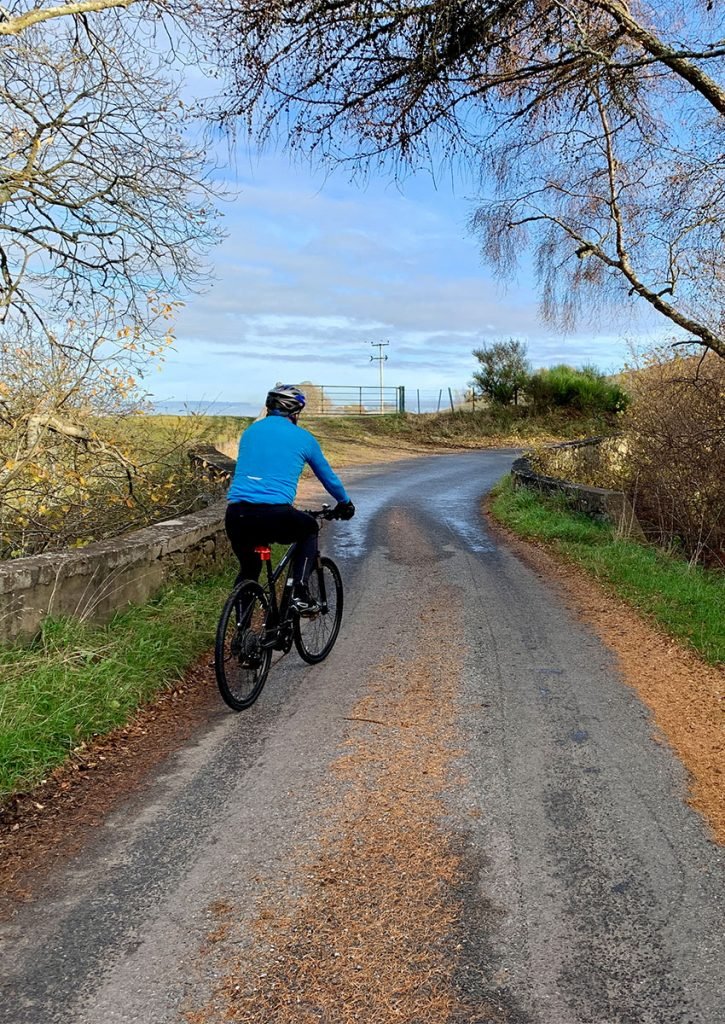 cyclist-on-a-narrow-road